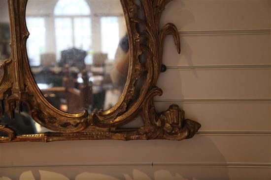 A fine George III Chippendale carved and giltwood wall mirror, H.3ft 11in. W.5ft 4in.